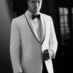 Man in white tuxedo jacket and bow tie