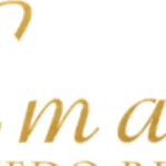Gold tuxedo emblem with stylized M and dots