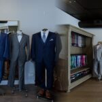 Men's suits and tuxedos on mannequins